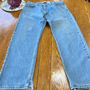 Levi’s 505 jeans. Size 36x32.  Regular fit, straight leg. Cuts and frayed cuffs